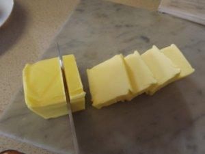 Butter being chopped