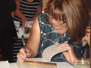 Signing, signing, signing up to twelve books for the same customer! My fellow Gippslanders really support their home-grown authors! 