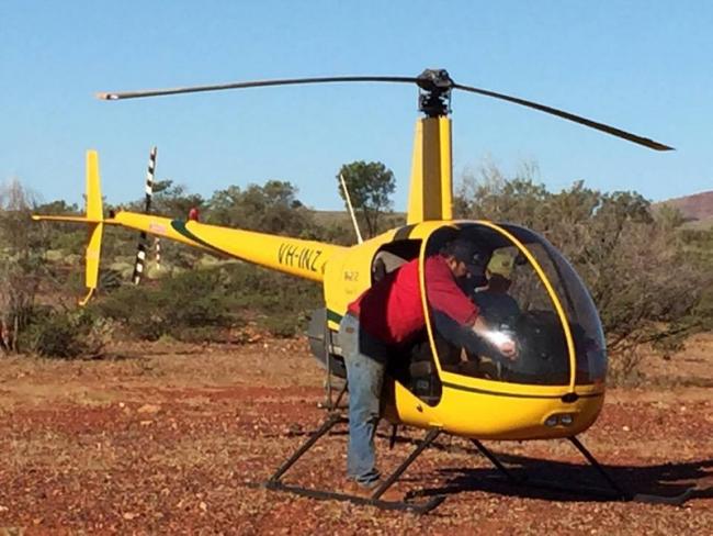 Spot that green John Deere hat... It's the Farm Boy who, today, conquered his very real fear of heights and went in the mustering helicopter! So, so very proud of him.